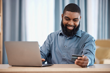 Image showing Business man, credit card and laptop for office online shopping, e commerce payment and happy loan. African employee on computer for web banking, financial investment or registration for debit order