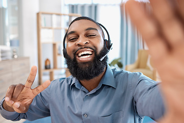 Image showing Call center, selfie and portrait of customer service consultant in the office with peace sign. Happy, smile and African male telemarketing agent taking a picture with headset in the modern workplace.