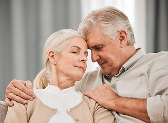 Image showing Old people, hug and forehead touch, relax on sofa with love and support, bonding while at home with trust and comfort. Couple together in marriage, partner and retirement with calm and peace of mind