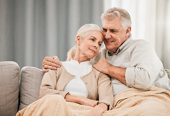 Image showing Old couple, hug and relax on couch with love and support, bonding while at home with trust and comfort. People with time together, marriage or life partner with retirement, calm and peace of mind