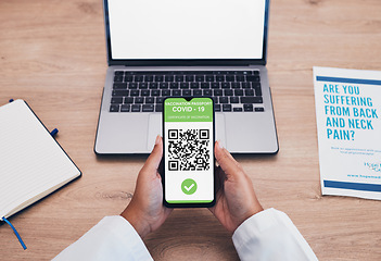 Image showing Doctor, qr code and hands with phone for with covid results and information with networking. Blank screen, mockup space and mobile healthcare with virus data for clinic report and digital review