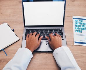 Image showing Doctor, worker and hands on laptop with hospital paperwork and research for medical journal. Blank screen, mockup space and office work with data analysis for clinic report and digital review