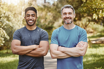 Image showing Men, arms crossed and together in portrait, fitness and health and ready for workout, training or summer. Partnership, personal trainer and outdoor sunshine for exercise, smile and wellness in nature