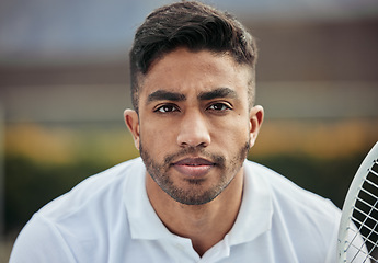 Image showing Serious, portrait and a man for a tennis game, fitness and getting ready for a match. Motivation, young and an athlete or sports player with a racket for cardio, workout or training with exercise