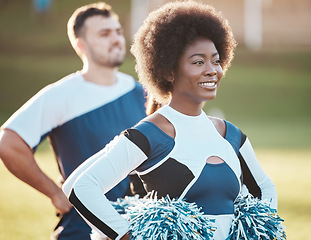 Image showing Cheerleader team, sports and black woman on field for performance, dance and motivation for game. Teamwork, dancer and happy people cheer for support in match, competition and sport event outdoors
