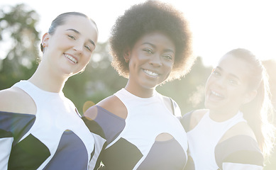 Image showing Cheerleader, happy and portrait of women for performance, dance and motivation for game. Teamwork, dancer and people in costume cheer for support in match, competition and sports event outdoors