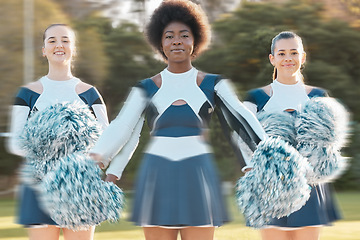 Image showing Cheerleader blur, sports and portrait of women for performance, dance and motivation for game. Teamwork, dancer and people in costume cheer for support in match, competition and field event outdoors