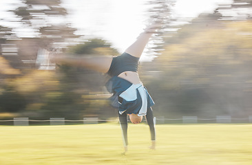 Image showing Cheerleader routine, cartwheel and field person exercise, action and training for sports competition, dance or contest. Cheerleading, fast motion blur and dancer performance, practice or rehearsal