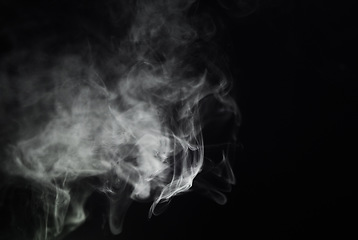 Image showing Smoking, cigarette and dark or black background with pattern, texture and mockup for abstract art of gas or cloud design. Vape, fog or smoke clouds in air pollution, texture or danger in empty studio