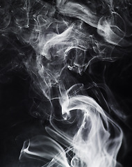 Image showing Smoke, fog or mist on dark background, vapor wave with cloud of gas and fantasy in a studio. Texture, steam or spray with mystery, magic and cigarette, dry ice with special effects and moving smog
