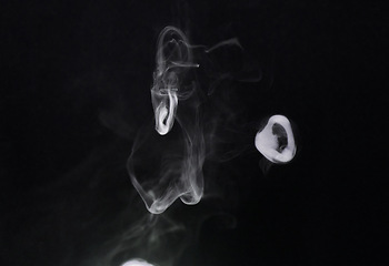 Image showing Smoke, fog and air puff on dark background, vapor wave with cloud of gas and fantasy in a studio. Texture, steam or spray with mystery, incense or mist, dry ice with special effects and moving smog