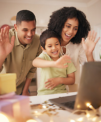 Image showing Happy birthday, video call and family with in a kitchen for celebration, excited and love in their home. Virtual, party and hello by parents with boy child online with cake, gift or waving gesture