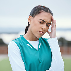 Image showing Sports, headache or face of girl on hockey field for fitness, exercise game or workout emergency. Tired woman, stress anxiety or sick athlete with migraine, injury or head pain frustrated by training