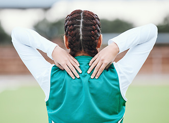 Image showing Athlete, field or sports woman with back pain in exercise, body training injury or outdoor workout. Girl, stress or injured female hockey player with burnout, accident or muscle problem emergency