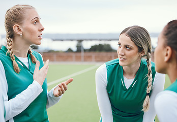 Image showing Sports, hockey team and strategy of women outdoor at field together for competition training. Fitness, group of girls and discussion for game planning, collaboration for workout and exercise at park