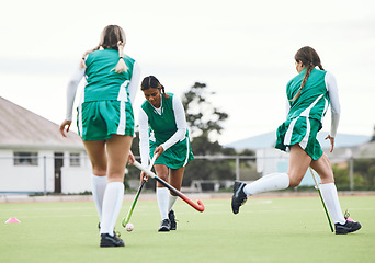 Image showing Hockey, group and women with fitness, game and training with competition, wellness and workout. People, players and girls playing, equipment or practice on a field, exercise and support with teamwork