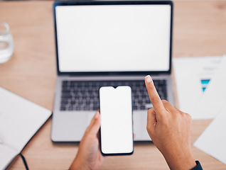 Image showing Person, hands and phone with laptop mockup for online marketing, web design or app at office. Closeup of employee pointing in computer or mobile smartphone display for UI, networking or advertising