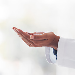 Image showing Palm, healthcare and a doctor with space in the hospital for artificial intelligence or metaverse innovation. Medical, future and hands with a medicine professional closeup in a clinic for analysis