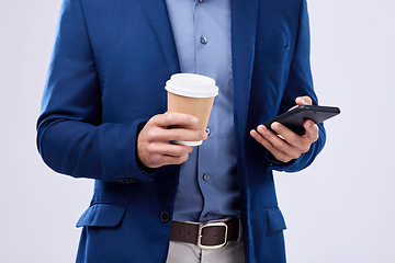 Image showing Phone, coffee and closeup of businessman hands in studio typing message on social media, mobile app or the internet. Technology, cappuccino and lawyer scroll online with cellphone by white background