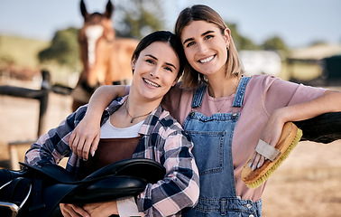 Image showing Horse, friends and portrait of women with saddle and brush for animal care, farm pet on ranch. Farming, countryside and happy people hug with stallion for bonding, relax and adventure outdoors