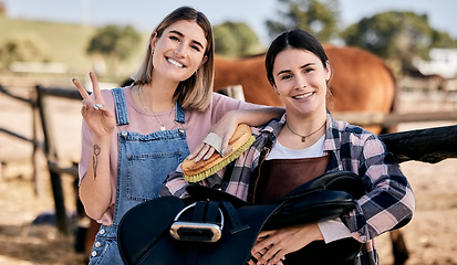 Image showing Horse, peace sign and portrait of women with saddle and brush for animal care, pet and happy on ranch. Farming friends, countryside and people with stallion for bonding, relax and adventure outdoors