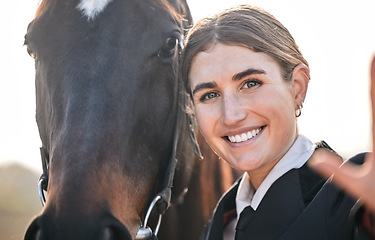 Image showing Selfie, equestrian and a woman with her horse on a ranch for sports, training or a leisure hobby. Portrait, smile or competition and a happy young rider in uniform with her stallion or mare outdoor