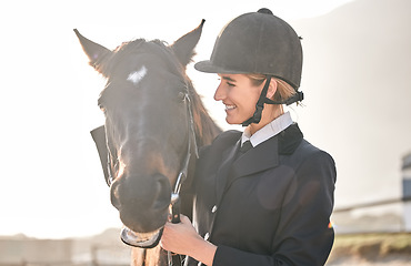 Image showing Equestrian, horse riding and a woman with an animal on a ranch for sports, training or a leisure hobby. Face, smile or competition and a happy young rider in uniform with her stallion or mare outdoor