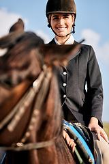 Image showing Portrait, equestrian and a woman with an animal on a ranch for sports, training or a leisure hobby. Horse riding, smile or competition and a happy young rider in uniform with her stallion outdoor