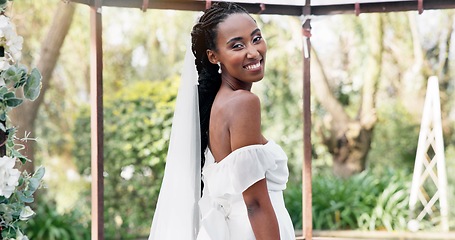 Image showing Wedding in garden, bride with smile in gazebo with flowers for celebration of love, future and commitment. Outdoor marriage, ceremony and happy black woman in with nature, sunshine and floral event.