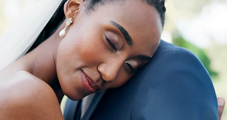 Image showing Happy, face and bride dance with groom with slow motion, movement and peace in outdoor, wedding or reception. Calm, couple and woman dancing with head on man shoulder with love and support together