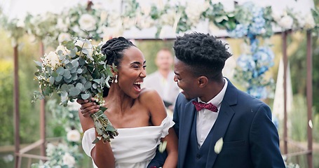 Image showing Couple, flower confetti and outdoor wedding with event, walk and happy laugh in nature. Black woman, man and excited for marriage, floral bouquet or holding hands in park, party or together in aisle