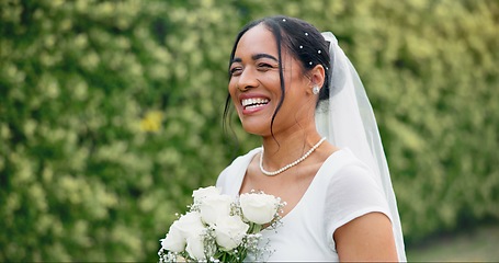 Image showing Wedding in garden, bride with smile and bouquet of roses for celebration of love, future and commitment. Outdoor marriage ceremony, excited and happy woman in with flowers, sunshine and floral event