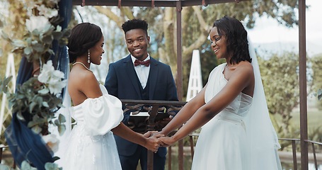 Image showing Women, lesbian wedding and celebration outdoor with priest for love, ceremony and together for commitment. Gay marriage, event and party with bride, black man and African lgbtq couple in garden