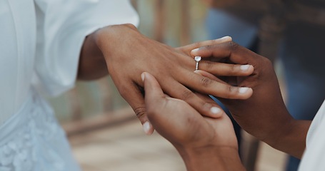 Image showing Couple, holding hands and jewellery for wedding, commitment or marriage union or ceremony with closeup outdoor. People, man and woman getting married for love, celebration and support with ring bond