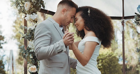 Image showing Couple, wedding and dancing with touch, outdoor and commitment in celebration, love and smile. Interracial marriage, fashion and happy in nature, peace and romance of union and trust