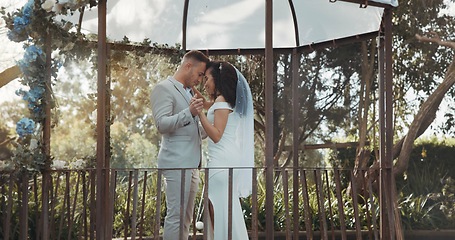 Image showing Couple, wedding and dance to celebrate marriage or commitment in garden for love, unity or dress. Happy partnership, trust or bride with groom in respect for together in gratitude, romance or support