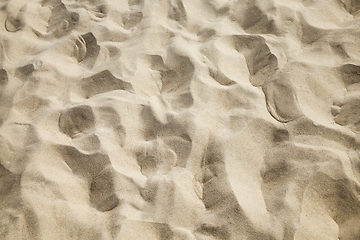 Image showing yellow light sand on the seashore