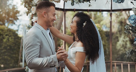 Image showing Couple, wedding and dancing with touch, smile and commitment in celebration. Interracial marriage, fashion and happy in outdoor, love and romance in conversation, trust and vertical in nature or cute