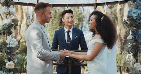 Image showing Love, dancing and couple at marriage for commitment and in celebration at a outdoor wedding ceremony or event for trust. Husband, wife and happy woman with smile and care for partner together