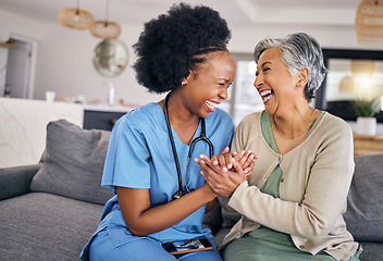 Image showing Smile, funny and assisted living caregiver with an old woman in her home during retirement together. Healthcare, support and a happy nurse or volunteer laughing with a senior patient on the sofa