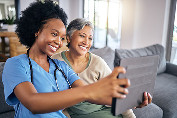 Image showing Selfie, tablet and assisted living caregiver with an old woman in the living room of a home together. Smile, support or community with a happy nurse or volunteer and senior patient in a house