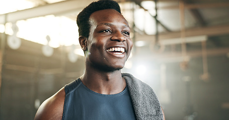 Image showing Smile, fitness and face of black man at a gym for training, exercise and athletics routine. Happy, mindset and African male personal trainer at sports studio for workout, progress and body challenge