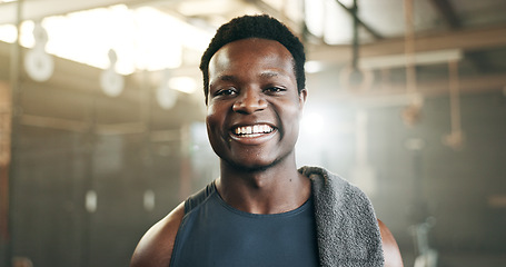 Image showing Happy, fitness and face of black man at a gym for training, exercise and athletics routine. Smile, portrait and African male personal trainer at sports studio for workout, progress and body challenge