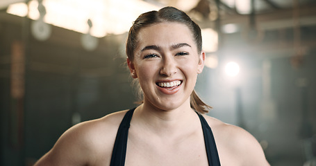 Image showing Laughing, fitness and face of happy woman at a gym for training, exercise and athletics routine. Smile, portrait and female personal trainer at sports studio for workout, progress and body challenge