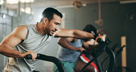 Image showing People, diversity and cycling at gym in workout, exercise or intense cardio fitness together and motivation. Diverse group burning sweat on bicycle machine for healthy body, wellness or lose weight