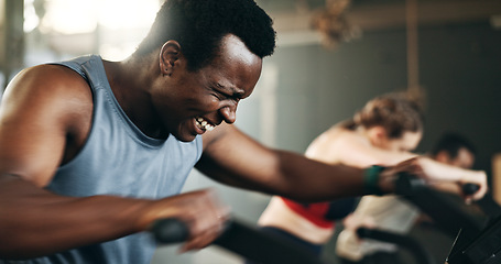 Image showing People, diversity and cycling on bicycle at gym in workout, exercise or intense cardio fitness together and motivation. Diverse group burning sweat on machine in healthy body, wellness or lose weight