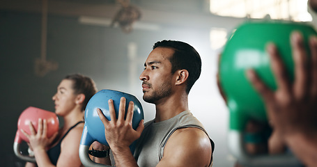 Image showing Gym, group fitness and kettlebell squat exercise for power, sports challenge and muscle. Serious asian man, bodybuilder and heavy weights for training in health club, workout class and strong friends