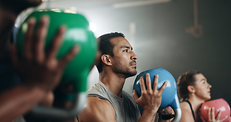 Image showing Gym, group fitness and kettlebell squat exercise for power, sports challenge and muscle. Serious asian man, bodybuilder and heavy weights for training in health club, workout class and strong friends