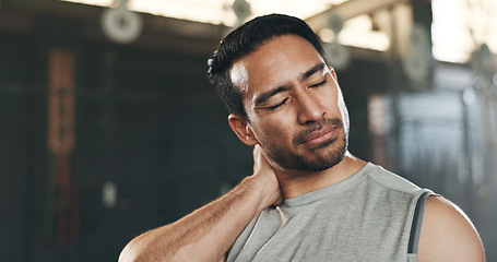 Image showing Fitness, neck pain and face of man at gym for training with muscle, problem or arthritis. Sports, injury and guy athlete with shoulder, joint or massage for backache, fibromyalgia or osteoporosis