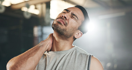 Image showing Fitness, neck pain and face of man at gym for training with muscle, problem or arthritis. Sports, injury and guy athlete with shoulder, joint or massage for backache, fibromyalgia or osteoporosis